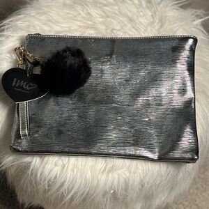 Oversized Metallic Silver Wristlet with Pom Pom